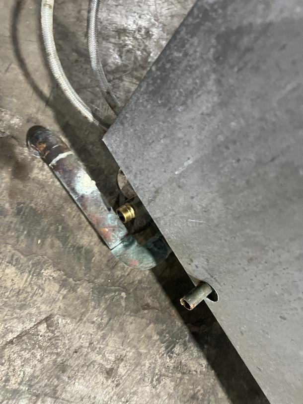 Cleveland Range steam jacketed kettles model 36GMK1010300, stainless steel, visible piping, on legs, good condition.