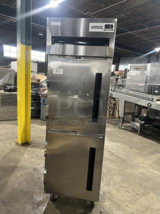 Delfield stainless steel half-door refrigerator, model 6000XL, with wired rack, on casters, SN: 0912152000020.