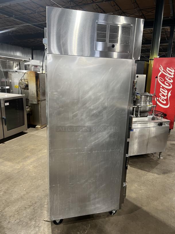 Delfield stainless steel half-door reach-in refrigerator on casters, with wired rack, SN: 0912152000020, in used condition.