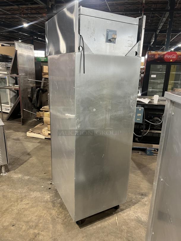 Delfield commercial stainless steel half-door single section reach-in refrigerator on casters with wired rack, SN: 0912152000020.