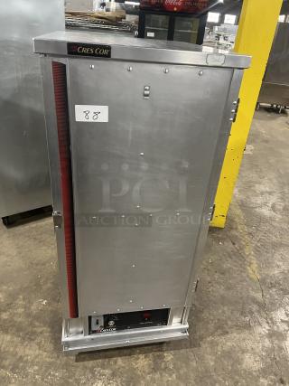 Cres Cor stainless steel heated holding/proofing cabinet, model 1290006, with built-in pan slides and caster wheels.