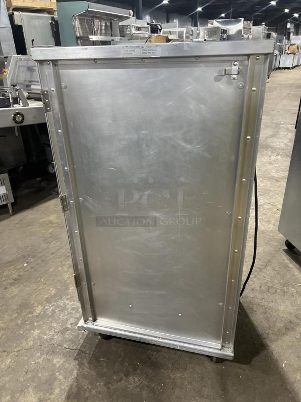 Cres Cor Model 1290006 stainless steel heated holding cabinet, electric, on casters, features built-in pan slides.