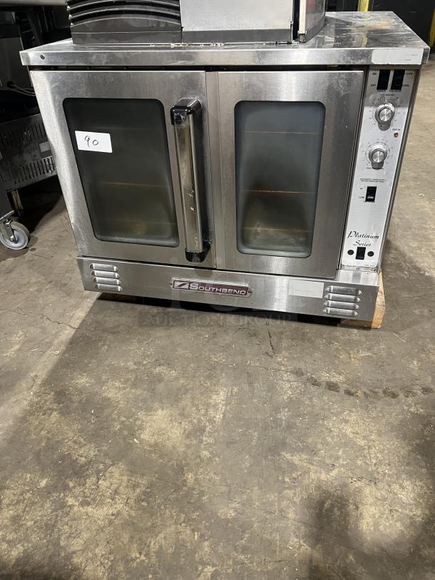 Southbend Platinum Series stainless steel gas convection oven, single stack, in used condition, visible control knobs and branding.