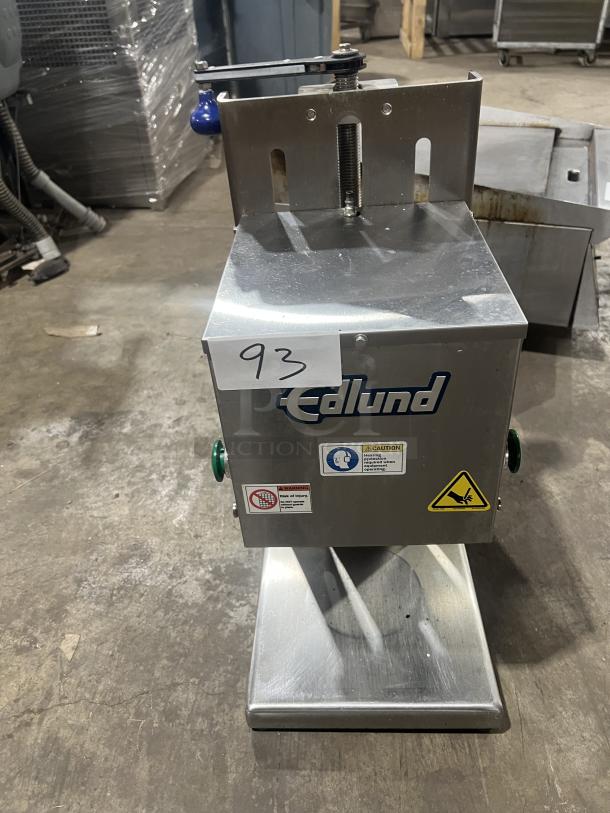 Edlund Model 625 commercial stainless steel countertop can opener, SN: 001793, with safety warning labels and Edlund branding.