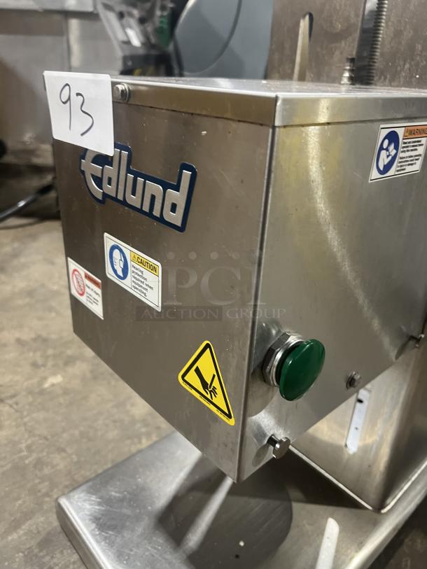 Edlund stainless steel countertop can opener, Model 625, SN: 001793. Features warning labels and Edlund branding.