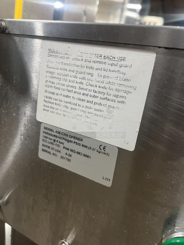 Edlund Model 625 commercial stainless steel countertop can opener, serial number 001793, in good condition. Instruction labels visible.