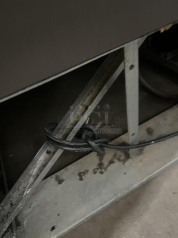 Beverage Air MT72 commercial refrigerator with poly coated rack, 3 glass doors. Model: MT72, SN: 2615804, 115V, 1 phase.