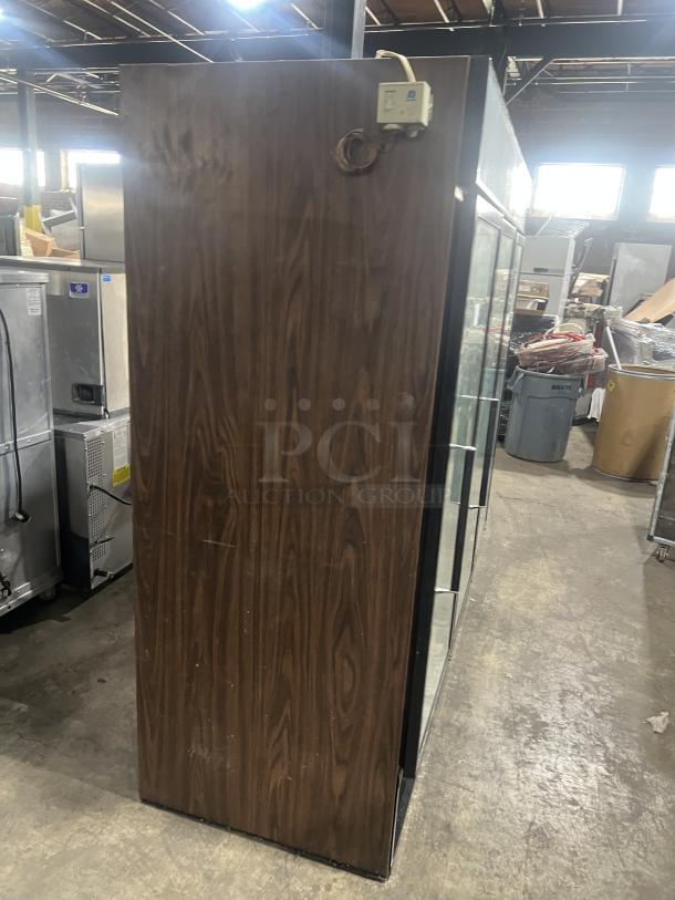 Beverage Air MT72 commercial fridge with 3 glass doors and poly coated wired rack. Model: MT72, SN: 2615804, 115V, 1 Phase.