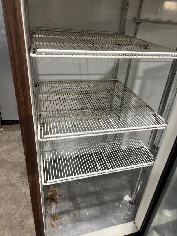Beverage Air MT72 3-door glass merchandiser refrigerator with poly coated wire racks. Model MT72, SN 2615804, 115V, 1 phase.