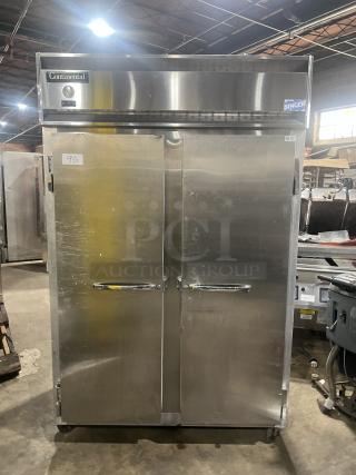 Continental 2R commercial stainless steel 2-door refrigerator, model 2R, on casters, serial 15568894, in used condition.