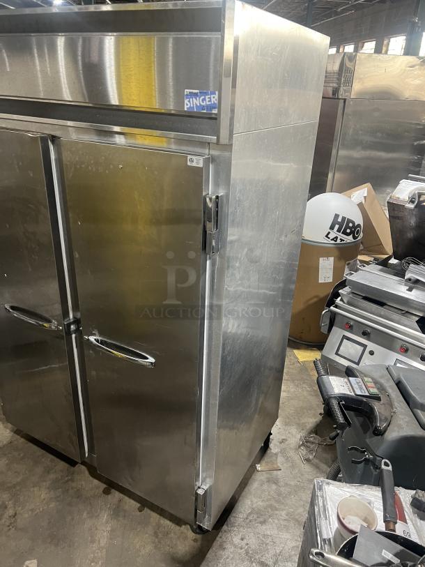Continental 2R stainless steel 2-door reach-in refrigerator, on casters, model 2R, SN: 15568894, 115V 1 Phase, used condition.