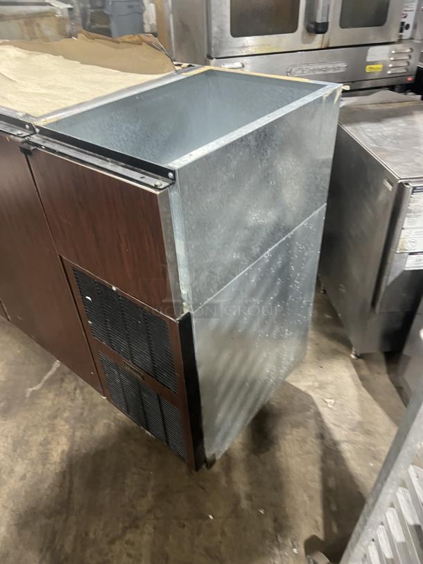 Perlick 3-door stainless steel bar back cooler, model C5064ESCUL, with wired rack and vents. Used condition.