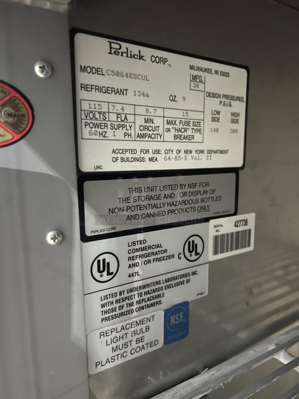 Perlick commercial stainless steel bar back cooler, model C5064ESCUL. Features: 3 doors, wired rack, 115V 1 phase. Serial 427736.