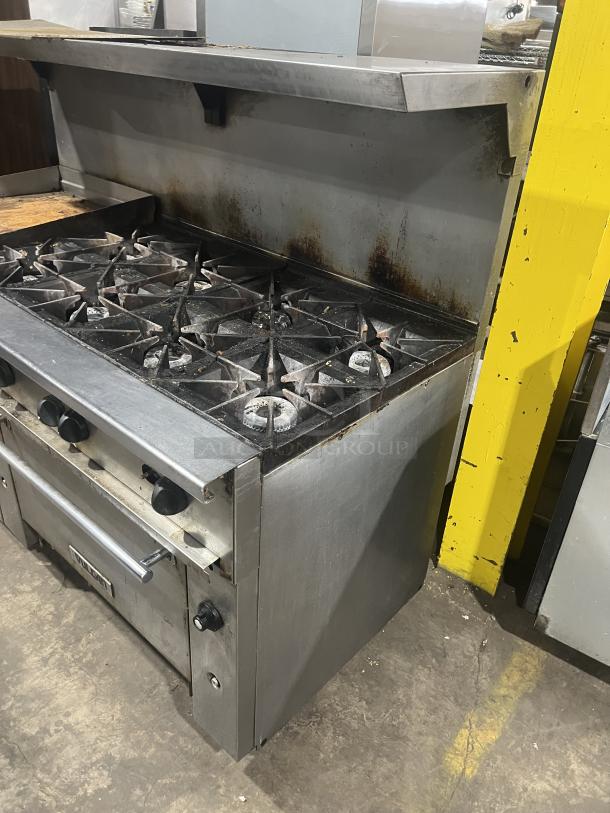 Vulcan 72SS-2-24G8B commercial 8-burner range/griddle, stainless steel, double oven, backsplash, salamander shelf.