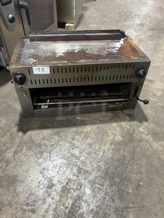 Commercial stainless steel gas salamander broiler, Vulcan brand, used with rust and wear, tagged "98", ideal for high-heat cooking.