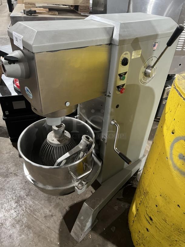 Univex SRM60+ commercial 60 qt mixer with stainless steel bowl, wire whisk, in working condition, on legs, 208-240V, 1 phase.