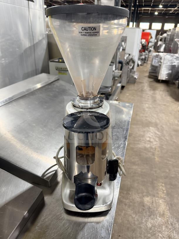 Mazzer Luigi SUPERJOLLYAUT espresso grinder with bean hopper, 110V, 1 phase. Features caution label, countertop model.