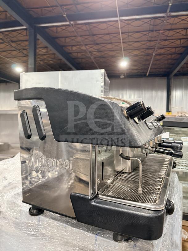 Danesi commercial stainless steel 3-group espresso machine, countertop model, in good condition with visible Danesi branding.