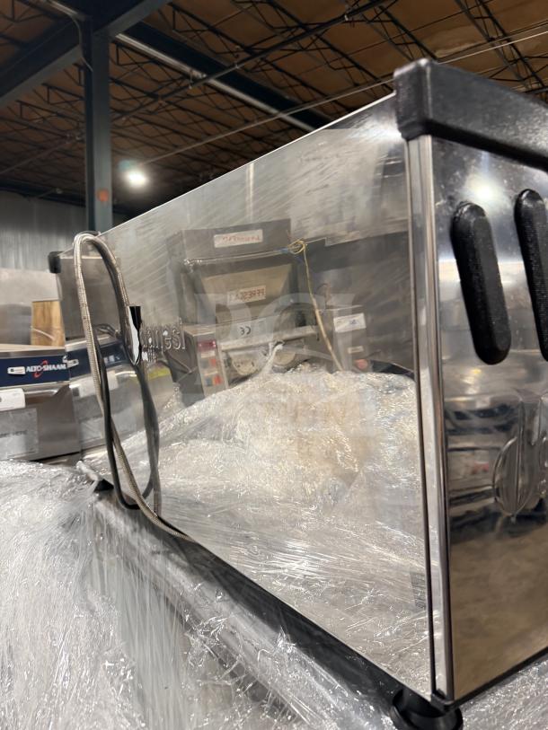 Danesi commercial stainless steel 3-group espresso machine, countertop model in used condition.