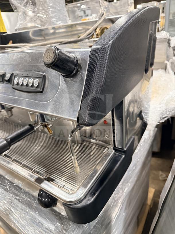 Danesi commercial stainless steel 3-group espresso coffee machine, countertop model, featuring multiple controls and portafilters.