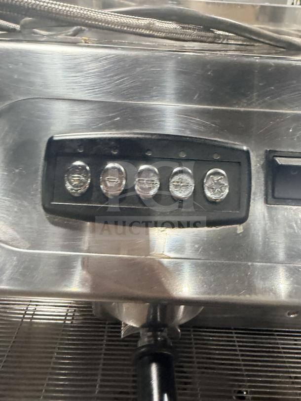 Danesi stainless steel 3-group espresso machine, commercial countertop model, control buttons shown, used condition.