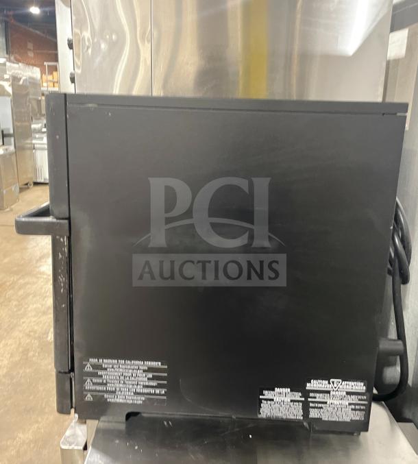 Merry Chef Eikon E2S Turbo Oven, 2022 model, countertop design, 208/240V, metal casing, visible safety labels, excellent condition.