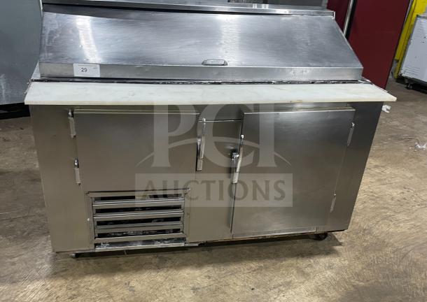 Commercial stainless steel 2-door refrigerated bain marie salad/sandwich prep table with cutting board, wired rack, and casters.