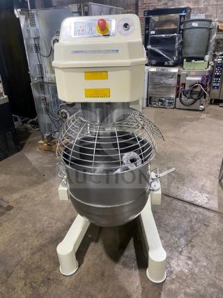 ABS SM80L heavy-duty 80 qt. planetary dough mixer with stainless steel bowl guard, mixing bowl, and flat beater attachment.