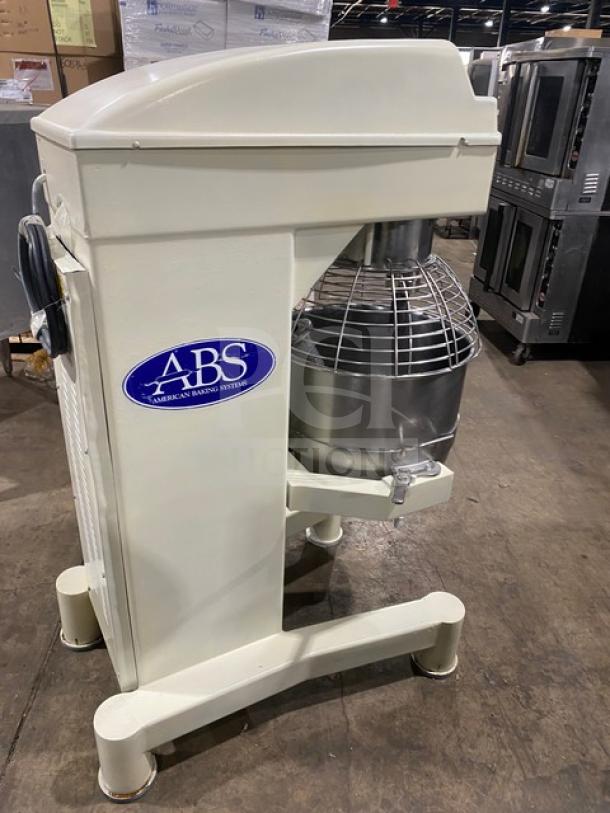 ABS SM80L 80 Qt. commercial dough mixer with stainless steel bowl guard, mixing bowl, and flat beater attachment. 208V, 3-phase.