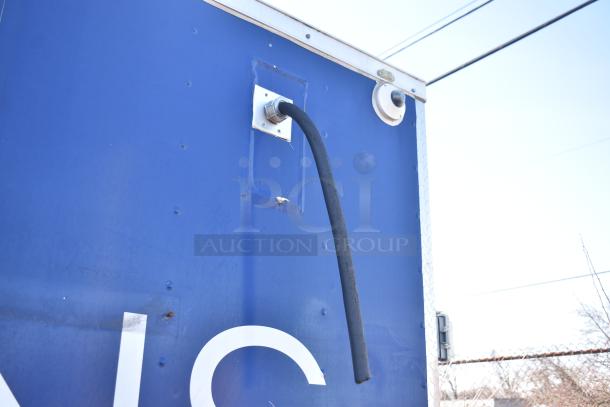 Exterior of 2019 Quality Cargo 8.5' x 24' mobile kitchen trailer with visible cable port.