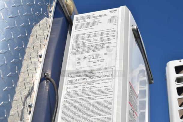 2019 Quality Cargo 8.5' x 24' mobile kitchen trailer with corporate spec equipment. Rinnai heater label details installation and safety info.