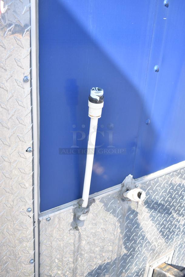 2019 Quality Cargo 8.5' x 24' mobile kitchen trailer with plumbing fixtures shown on aluminum side, VIN 50ZZ1E426KN012862.