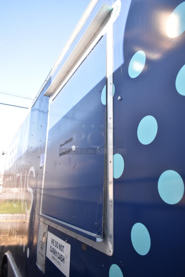 2019 Quality Cargo 8.5' x 24' mobile kitchen trailer, equipped with grease hood, refrigeration, fryers, and griddle.