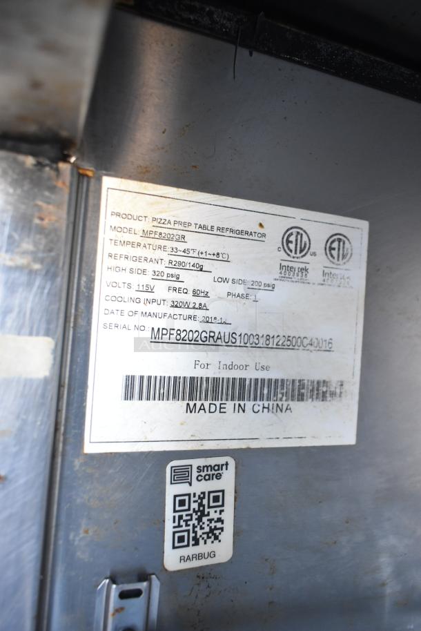 Label on a refrigerator in a 2019 mobile kitchen trailer. Model: MPF8202GR, temperature: 33-45°F, 115V, Made in China.