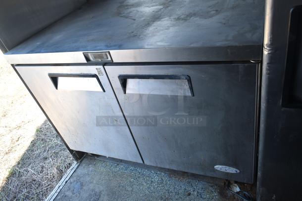 2019 Quality Cargo 8.5' x 24' mobile kitchen trailer refrigeration unit, showing stainless steel double-door cooler, Burger King spec.