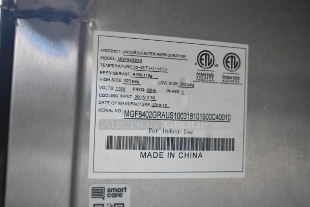 Label on the undercounter refrigerator model MGF8402GR in the 2019 mobile kitchen trailer, showing specs and serial.