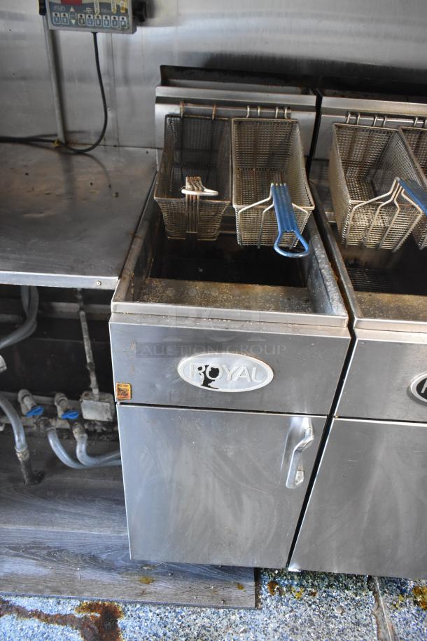 2019 Quality Cargo mobile kitchen trailer with Royal fryers, grease hood, refrigeration, griddle, and control panel.