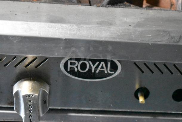 Close-up of the Royal branding on a control knob, part of the 2019 Quality Cargo mobile kitchen trailer's equipment.