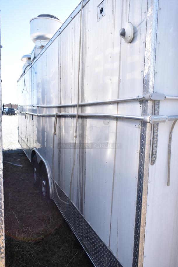 2019 Quality Cargo 8.5' x 24' mobile kitchen trailer, Burger King spec, fully equipped, visible grease hood, and refrigeration.