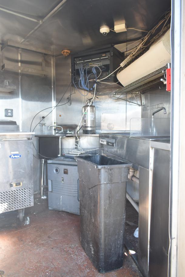 2019 Quality Cargo 8.5' x 24' mobile kitchen trailer, Burger King spec, featuring grease hood, refrigeration, and cooking equipment.