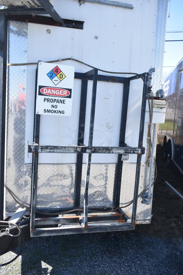 2019 Quality Cargo mobile kitchen trailer, 8.5' x 24', Burger King corporate spec, equipped with grease hood, refrigeration, fryers, and griddle. Visible propane safety sign.