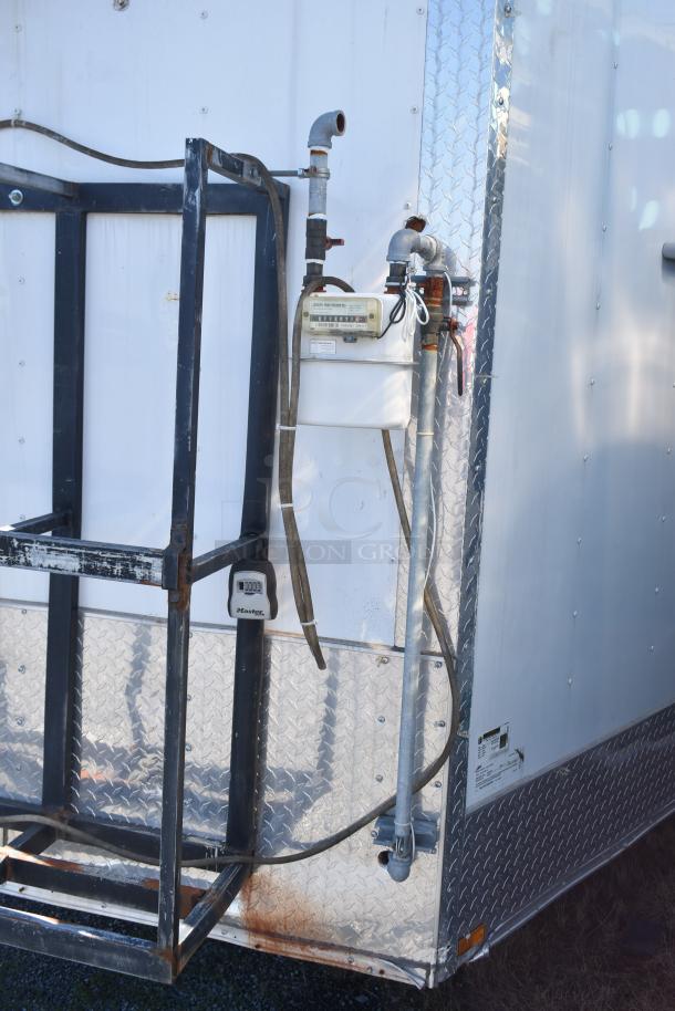 2019 Quality Cargo 8.5' x 24' mobile kitchen trailer exterior, showing fuel connections and metal structure details.