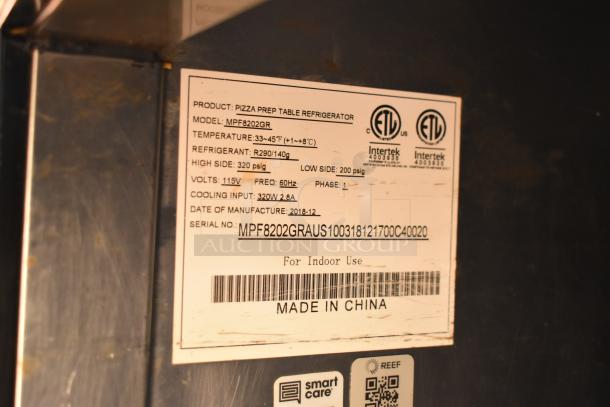 Label on refrigeration unit showing model MPF8202GR, temperature range 33-45°F, voltage 115V, and date of manufacture 12/2018.