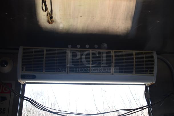 Interior view of 2019 Quality Cargo mobile kitchen trailer, showing an overhead air vent. Part of a fully outfitted unit.