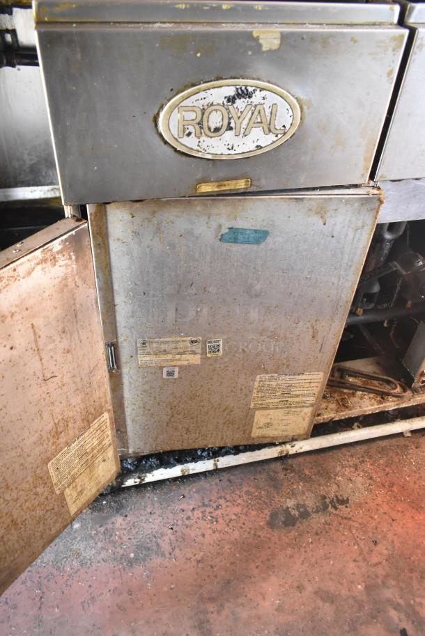 2019 Quality Cargo mobile kitchen trailer with grease hood and Royal griddle. Visible wear and NSF labels. VIN 50ZZ1E427KN012840.