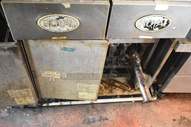 2019 Quality Cargo mobile kitchen trailer, featuring Royal brand appliances. Visible wear on grill and fryer units.