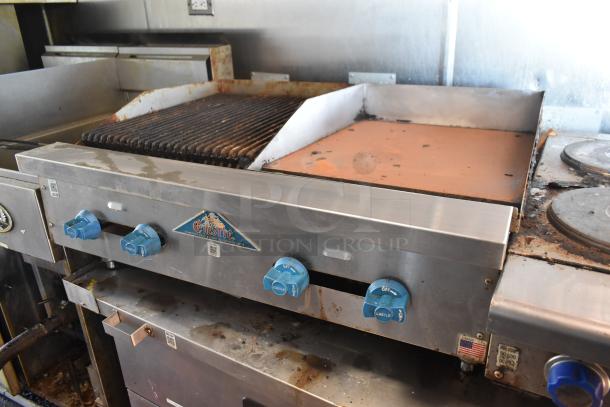 2019 Quality Cargo mobile kitchen trailer, featuring a griddle with blue control knobs, grease hood, and Castle branding.