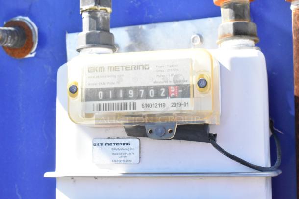 Alt text: EKM Metering model EKM-PGM.75 with serial number S/N012119, measuring device with fittings and connections.