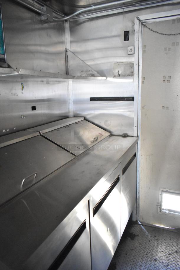 2020 Diamond Cargo 8.5' x 24' mobile kitchen trailer interior, featuring stainless steel surfaces.