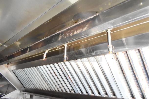 Ventilation hood in a 2020 Diamond Cargo mobile kitchen trailer, featuring grease hood with visible wear.